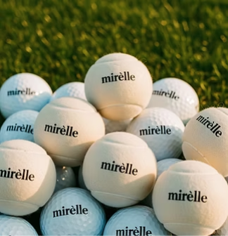 Mirelle Wear branded tennis ball - custom athletic brand design by Data Spark LLC